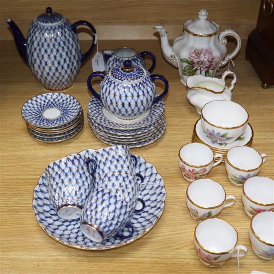 A Lomonosov Cobalt Net coffee service for six and a Spode coffee service decorated with pink flowers